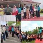 PJ Bupati Pringsewu Adi Erlansyah Menyematkan Simbolis Rompi Smart Village Dalam Acara Pringsewu Menyapa Di Alun Alun Pandan Sari
