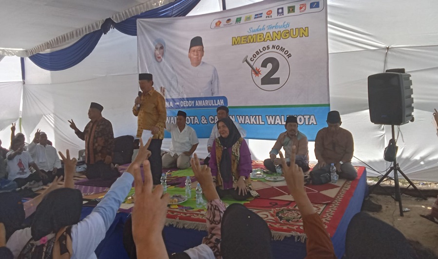 Kampanye di Kelurahan Kota Karang Raya, Pasangan Eva-Deddy Sampaikan Program Bedah Rumah