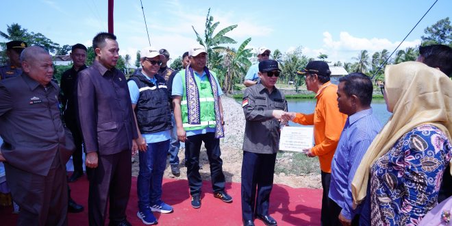 Pj.Bupati Pringsewu Resmikan Pompa Irigasi Berbasis PLTS