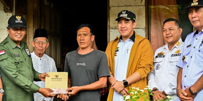 Bupati Dendi Ramadhona Hadiri Penyerahan Bantuan Bedah Rumah Layak Sehat untuk Masyarakat Desa Sidodadi dan Gunung Sugih