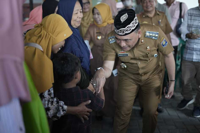 Sebanyak 668 KPM di Kota Metro terima bantuan Buku Tabungan PKH