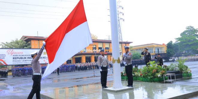 Guyuran Hujan Tak Halangi Semangat Personel Polda Lampung Peringati HUT ke-81 Kemerdekaan RI